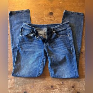 ElieTahari Adena classic fit, mid-rise, relaxed straight leg jean.